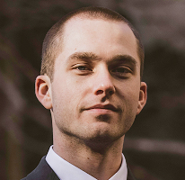 Thomas Whitfield trading analyst portrait crypto market expert
